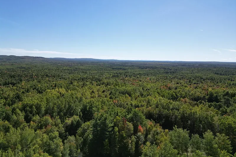 Ultimate Off-Grid Haven: 230.9-Acre Riverfront Sanctuary in Lowell, Maine