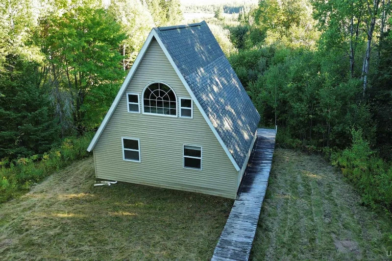 Investment & Real Estate Analysis: 10.33-Acre Waterfront A-Frame Cabin in Newberry, MI